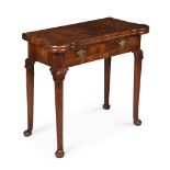 A GEORGE II WALNUT AND FEATHER BANDED FOLDING CARD TABLE, CIRCA 1735