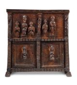 A NORTH ITALIAN CARVED PINE AND WALNUT VESTMENT CHEST, 16TH/17TH CENTURY