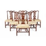 A SET OF SIX GEORGE III MAHOGANY DINING CHAIRS, IN THE MANNER OF THOMAS CHIPPENDALE, CIRCA 1770