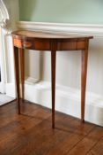 Y A GEORGE III SATINWOOD, TULIPWOOD, BURR YEW AND MARQUETRY DEMI-LUNE CONSOLE TABLE, CIRCA 1790