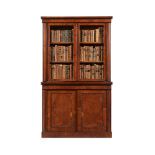 AN UNUSUAL REGENCY POLLARD OAK AND EBONISED BOOKCASE CABINET, CIRCA 1820