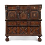 A CHARLES II OAK CHEST OF DRAWERS, CIRCA 1686