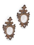 A PAIR OF ITALIAN CARVED GILTWOOD WALL MIRRORS, PROBABLY VENETIAN, FIRST HALF 18TH CENTURY