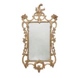 A GEORGE II CARVED GILTWOOD MIRROR, POSSIBLY IRISH, MID 18TH CENTURY