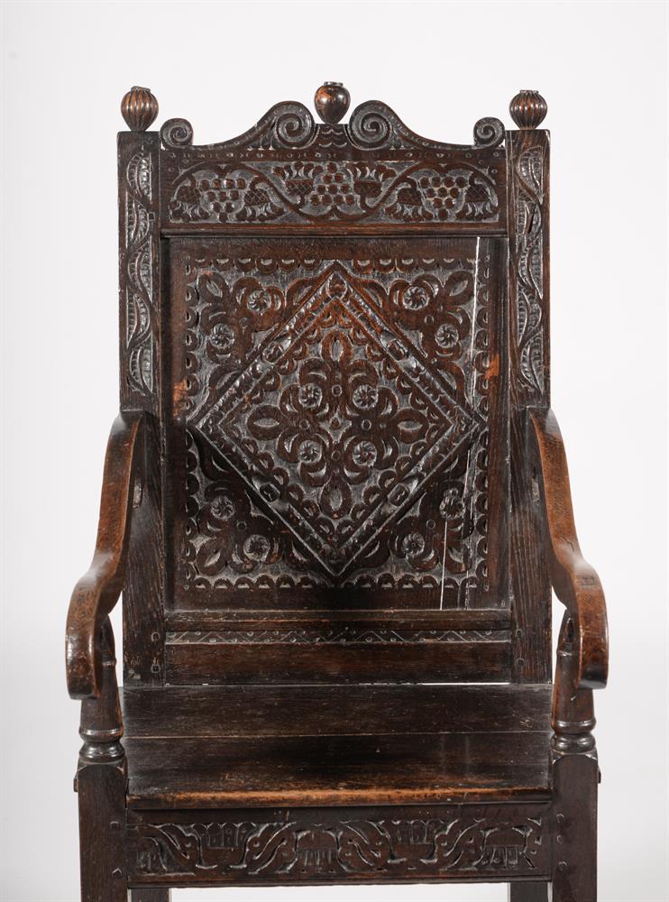 A CHARLES II CARVED OAK PANEL BACK ARMCHAIR, POSSIBLY YORKSHIRE, CIRCA 1660 - Image 2 of 2