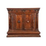 AN ITALIAN CARVED WALNUT SIDE CABINET, FIRST HALF 16TH CENTURY