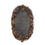 A CARVED WALNUT AND PARCEL GILT WALL MIRROR, EARLY 18TH CENTURY AND LATER