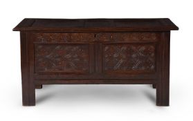 A JAMES I OAK PANELLED CHEST OR COFFER, CIRCA 1620