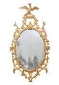A CARVED GILTWOOD MIRROR, IN GEORGE III STYLE, 19TH CENTURY