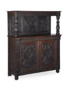 A VICTORIAN CARVED OAK COURT CUPBOARD IN ELIZABETHAN TASTE