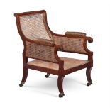 A MAHOGANY LIBRARY ARMCHAIR IN REGENCY STYLE