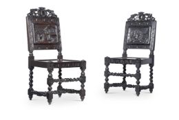 A PAIR OF CARVED OAK SIDE CHAIRS IN 17TH CENTURY STYLE