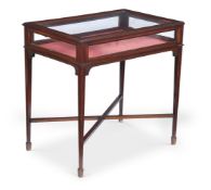 AN EDWARDIAN MAHOGANY AND LINE INLAID BIJOUTERIE TABLE