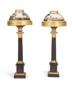 A PAIR OF PATINATED AND GILT METAL TABLE LAMPS IN EMPIRE STYLE