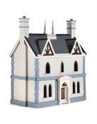 A DOLL'S HOUSE IN 19TH CENTURY GOTHIC TASTE