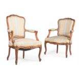 A PAIR OF FRENCH WALNUT AND UPHOLSTERED ARMCHAIRS