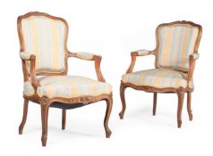 A PAIR OF FRENCH WALNUT AND UPHOLSTERED ARMCHAIRS