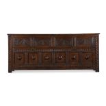 A LARGE CARVED OAK MULE CHEST OR SIDE CABINET IN 17TH CENTURY STYLE