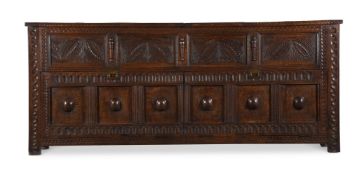 A LARGE CARVED OAK MULE CHEST OR SIDE CABINET IN 17TH CENTURY STYLE