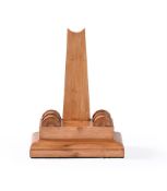 A CARVED WOOD PLATE STAND