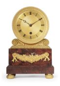 Y A GILT-METAL AND RED-MARBLE MOUNTED MANTEL TIMEPIECE IN DRUM CASE, BY HAY