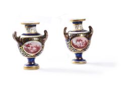 A PAIR OF ENGLISH PORCELAIN BLUE-GROUND AND GILT TWO-HANDLED VASES