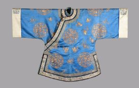 An elaborate side fastening Chinese women's bright blue jacket