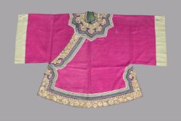A fine Chinese magenta silk damask Chinese women's robe
