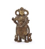 A Chinese gilt-bronze figure of Weituo