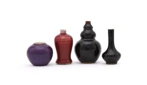 A group of four Chinese miniature vases