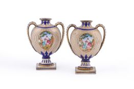 A small pair of Chinese Export Canton enamel vases