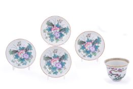 A set of four Chinese famille rose saucer dishes and one cup