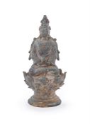 A Chinese bronze figure of a seated Buddha