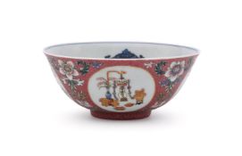 A Chinese famille rose ruby-ground scraffiato bowl