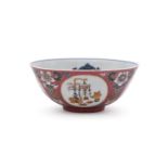 A Chinese famille rose ruby-ground scraffiato bowl