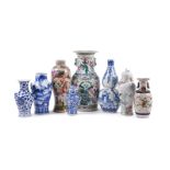 A group of Chinese blue and white and famille rose vases