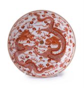 A Chinese iron red 'Dragon' plate