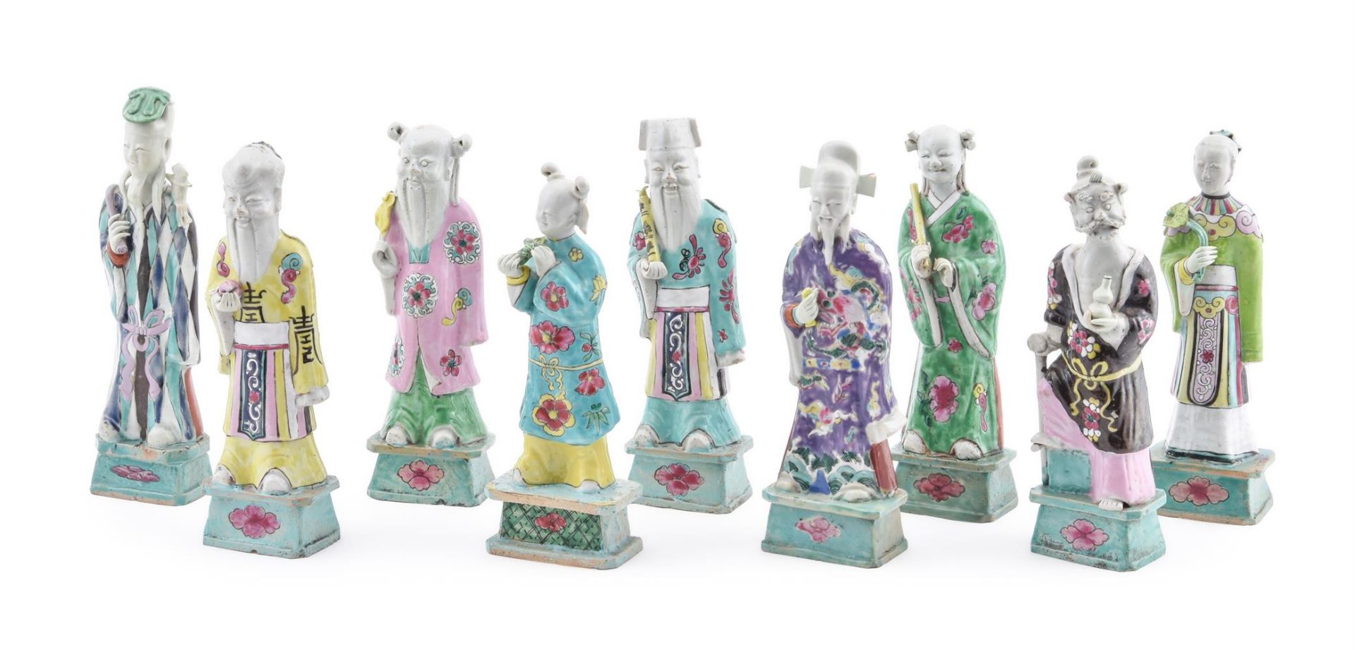 Eight Chinese Export Famille Rose figures of Immortals