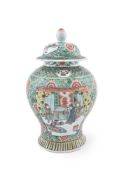 A Chinese Famille Verte vase and cover