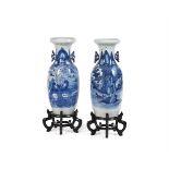 A large pair of Chinese blue and white vases