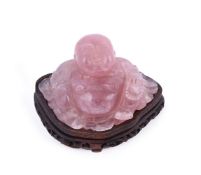 A Chinese rose quartz figure of Budai