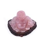 A Chinese rose quartz figure of Budai