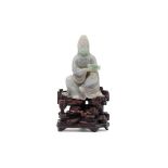 A Chinese jadeite figure of Guanyin