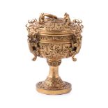 A Chinese gilt bronze dou censer and cover