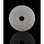 A Chinese celadon jade disc