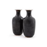 A pair of Chinese black glazed vases