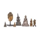 A small group of various gilt metal and silvered Buddhas