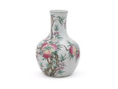 A Chinese famille rose 'nine peaches' vase