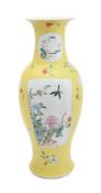 A Chinese yellow-ground famille rose sgraffito vase