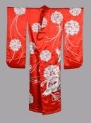 A very elaborate bright red Japanese wedding Kimono